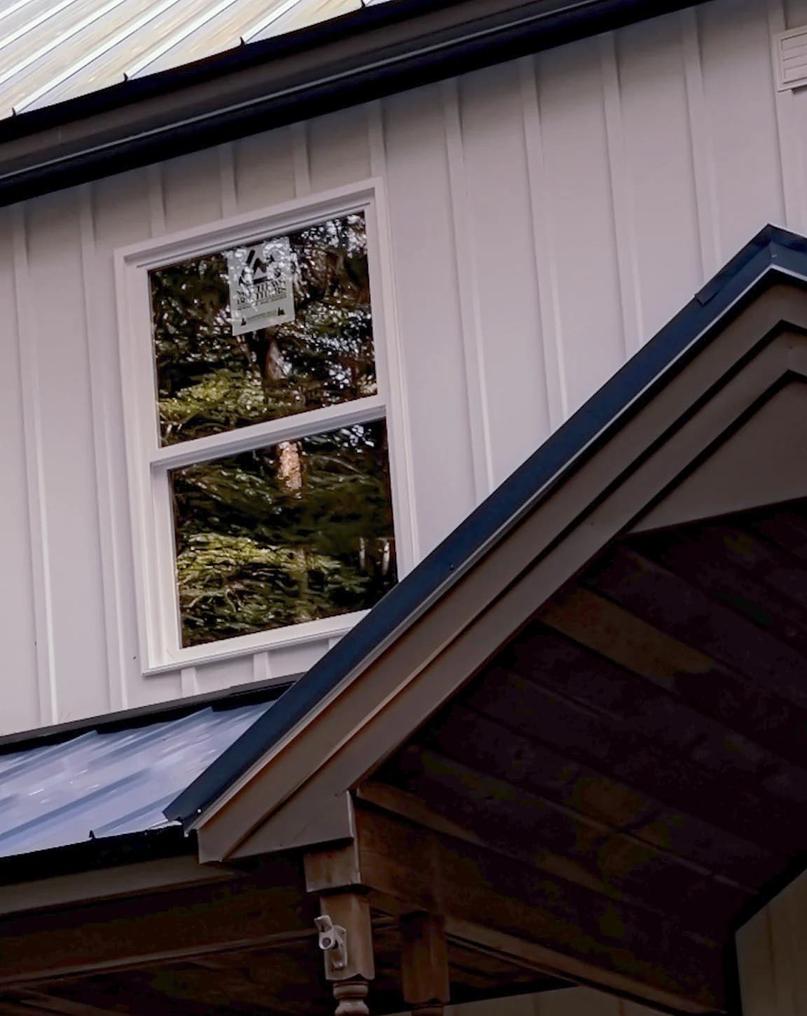 Replacement window detail on a home in Freeport, Maine by GraniteShield Roofing & Exteriors