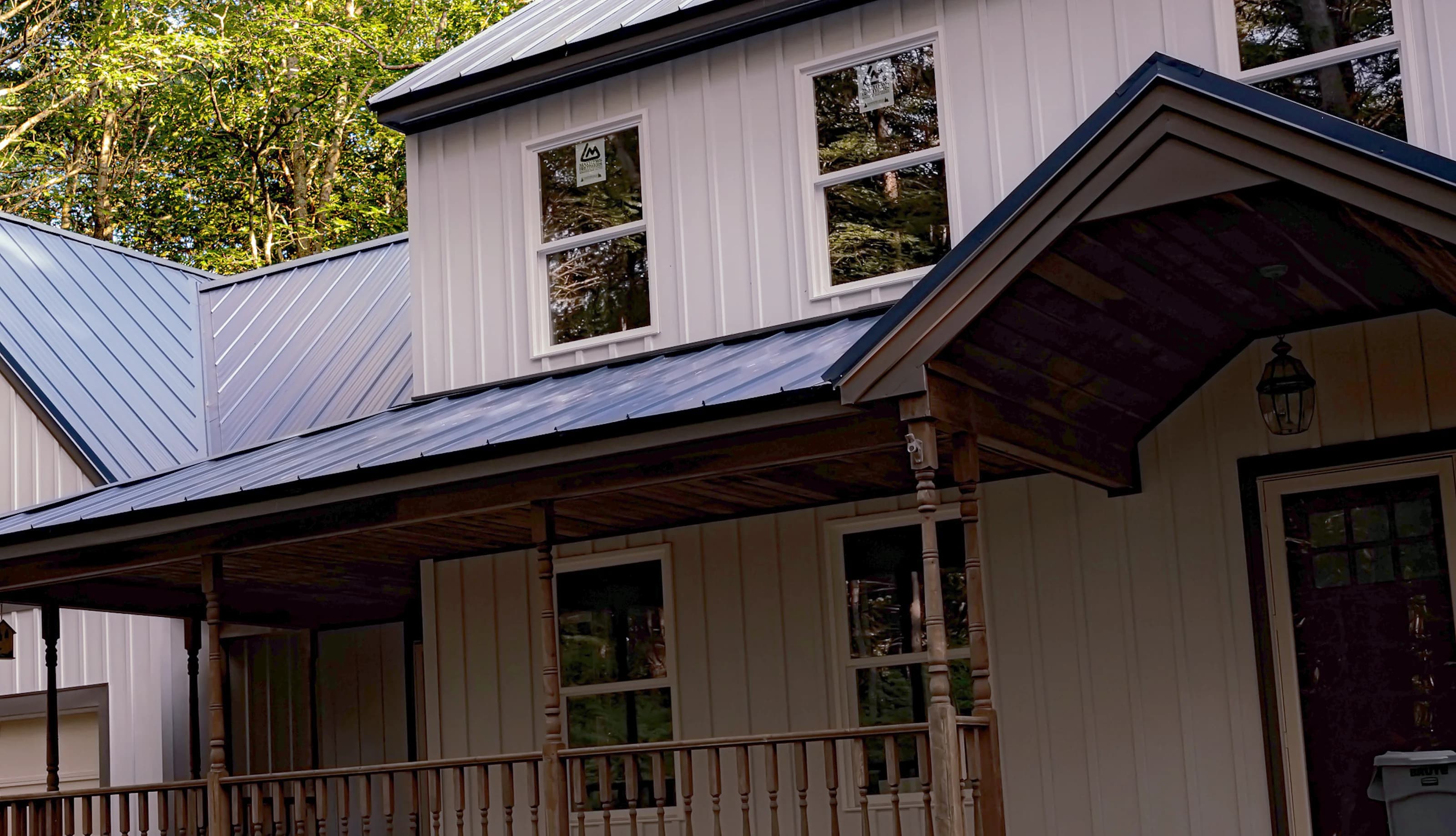 Completed standing seam metal roof and full exterior on a home in Freeport, Maine by GraniteShield Roofing & Exteriors